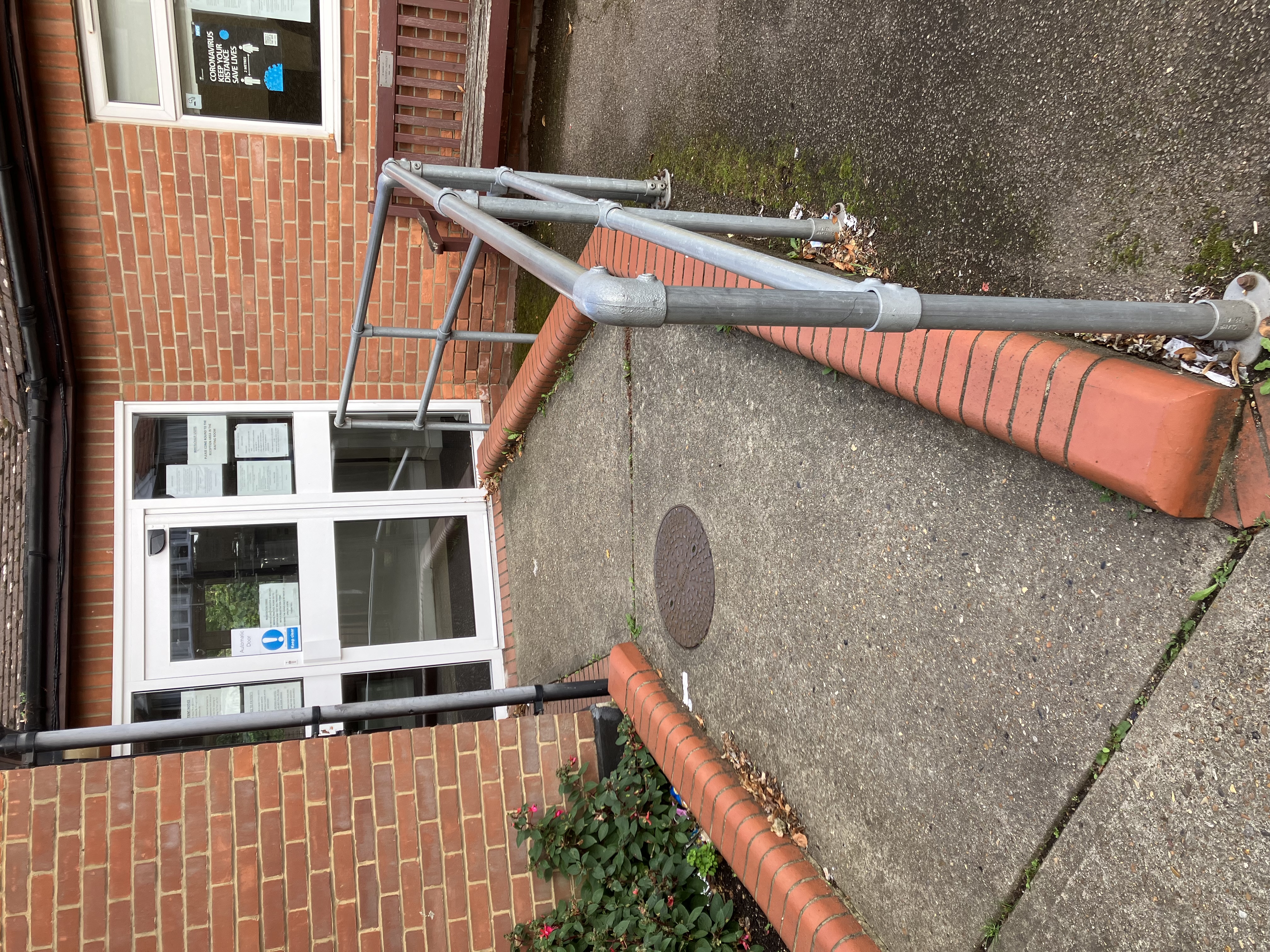 path to the front door with railings on one side